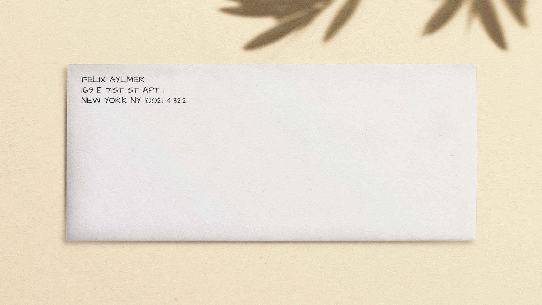 envelope with return address on upper left corner