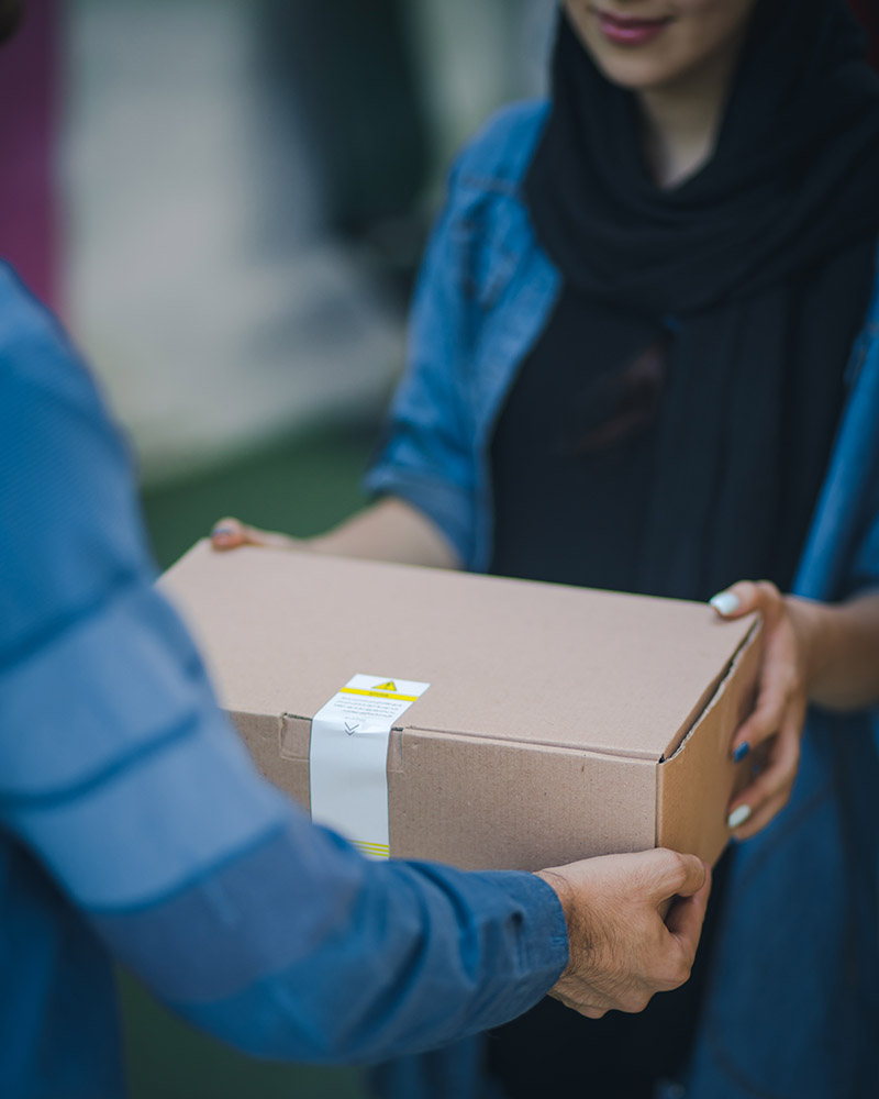 person hading over a shipment